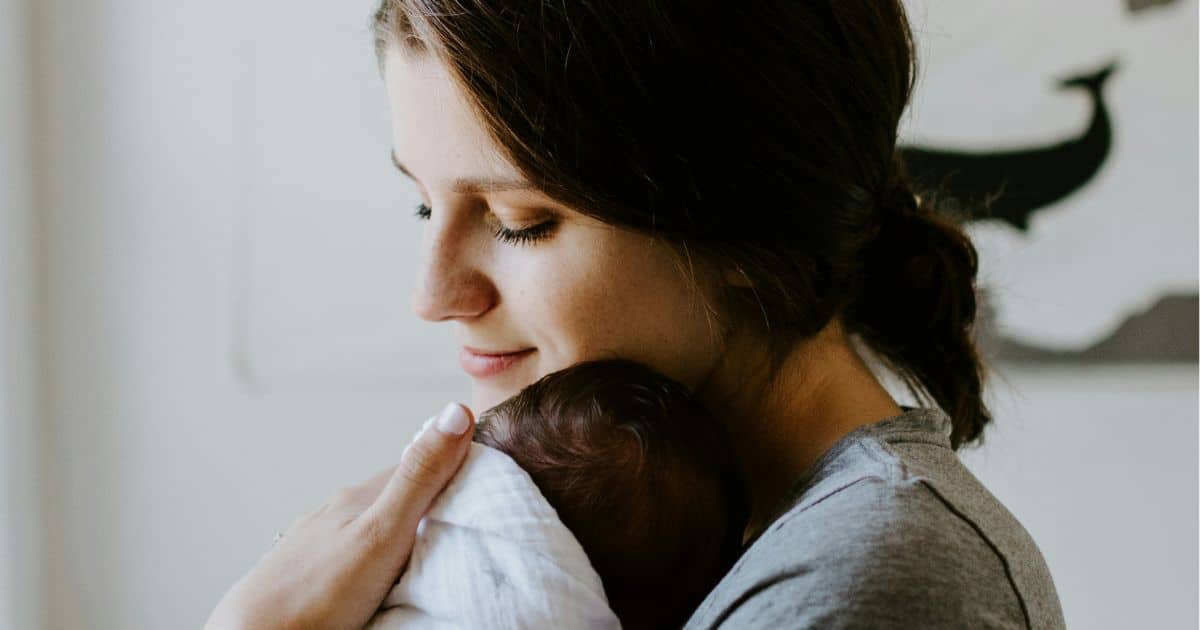 Postpartum Mom with newborn baby