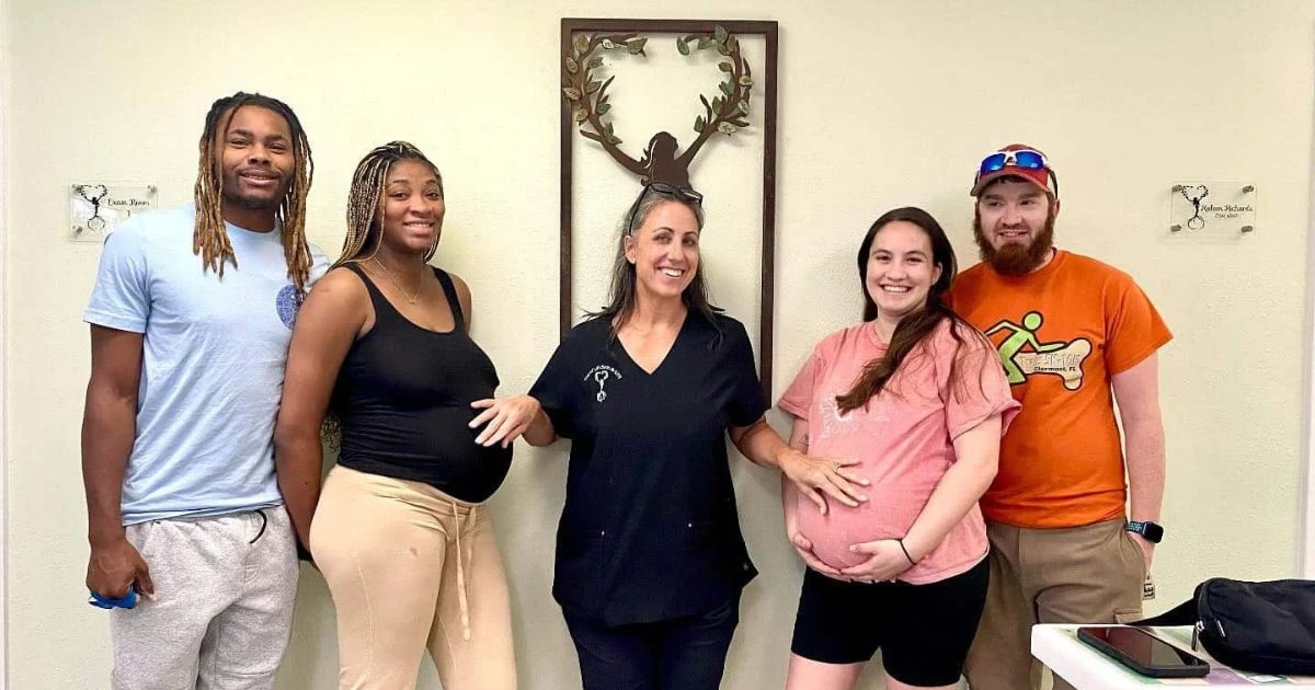 Central Florida midwife Kaleen Richards, CNM, with two pregnant families at Tree of Life Birth Center.