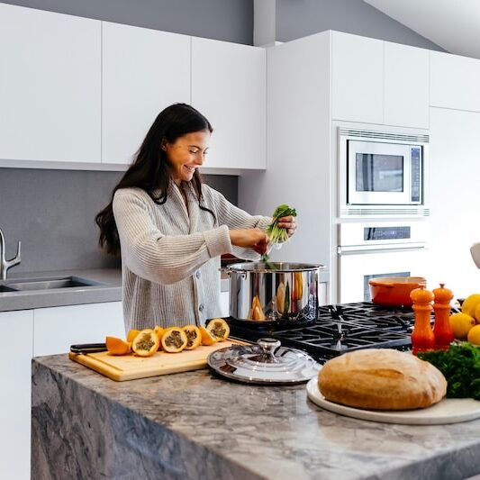 woman cooking healthy meal